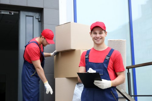 Moving van and packed boxes outside a Hornchurch home